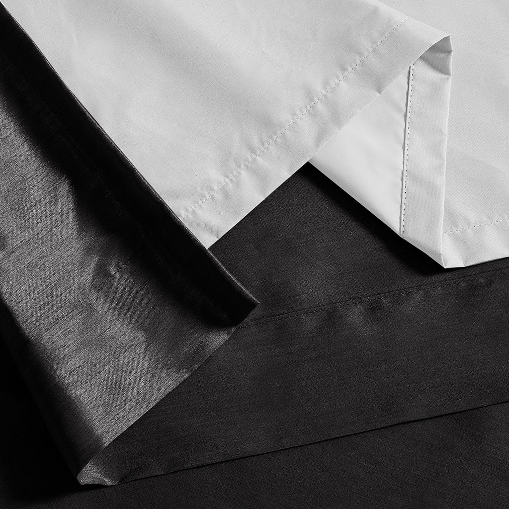 Emilia 100% Polyester Solid Faux Silk Lined Twist Tab Total Blackout Window Curtain - Black