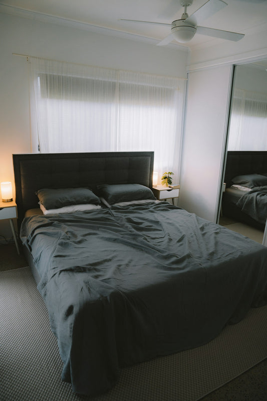 Charcoal bed linen on bed